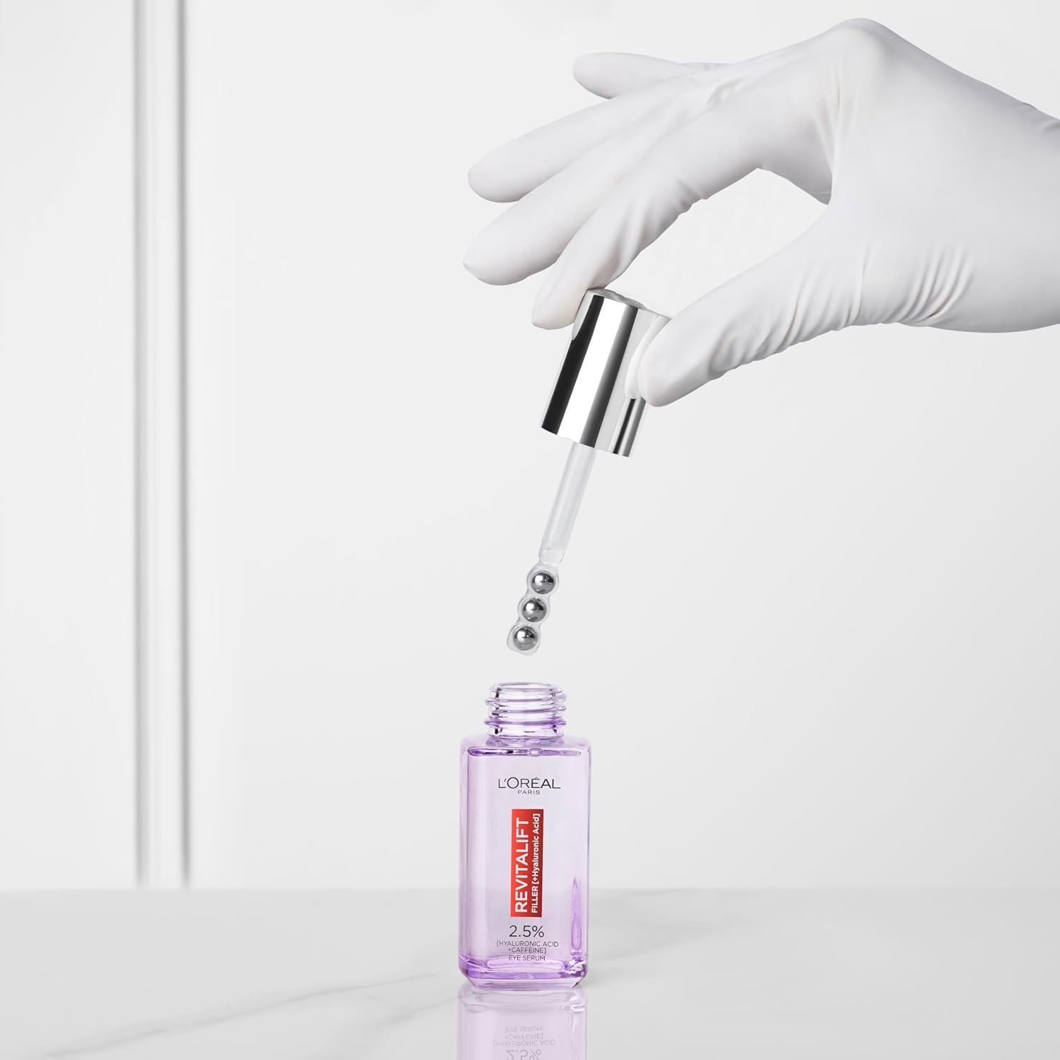 L'Oréal Paris 2.5% Hyaluronic Acid and Caffeine Eye Serum, Revitalift Filler, Replumps, Brightens And De-Puffs Eyes – 20ml - Image 5